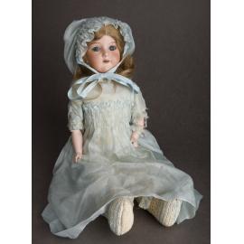 Bisque and leather doll